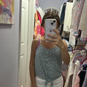 This is a blue and white flora top from Abercrombie kids.
